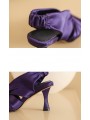 Purple satin square-toe high-heel mules featuring an elasticated back strap and leather insole.