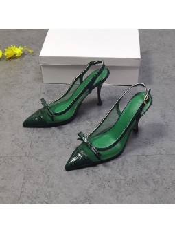 Green leather slingback pumps with stiletto heels, featuring a pointed toe with a bow and a gold-tone metal buckle