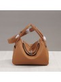 Warm and authentic, this caramel leather bag is the essence of natural chic.