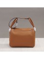 Warm and authentic, this caramel leather bag is the essence of natural chic.