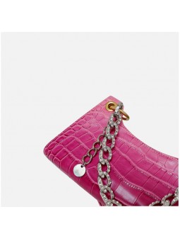 Elegant crocodile-embossed leather shoulder bag with a raspberry gradient finish and gold-tone accents.