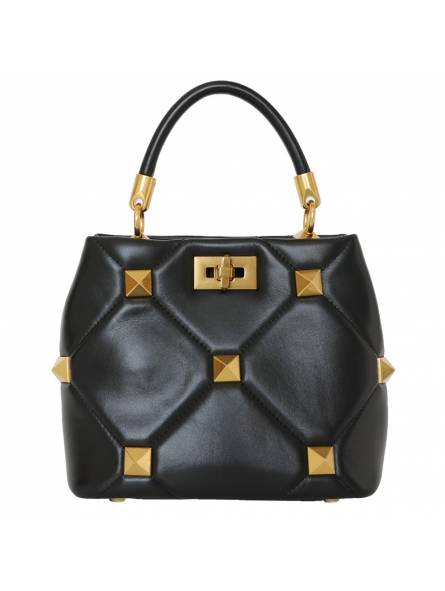 Black quilted studded leather handbag with sliding chain and protective feet. Gold finish for a refined look.