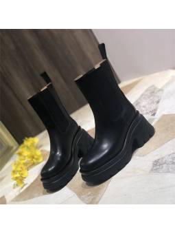 Chelsea black high heel boots with  black sole in leather