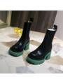 Chelsea black high heel boots with  green sole in leather