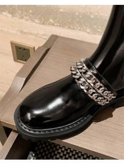 Black patent leather Chelsea boots with double chains