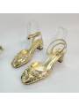 Women's high-heeled sandals  gold color, adorned with sparkling crystals, featuring a genuine leather insole for optimal comfort