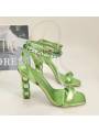 ​Green stiletto-heeled lace-up sandals for women, adorned with sparkling crystals