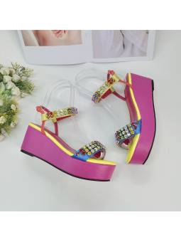 Women's pink platform sandals with genuine leather insole and open toe.