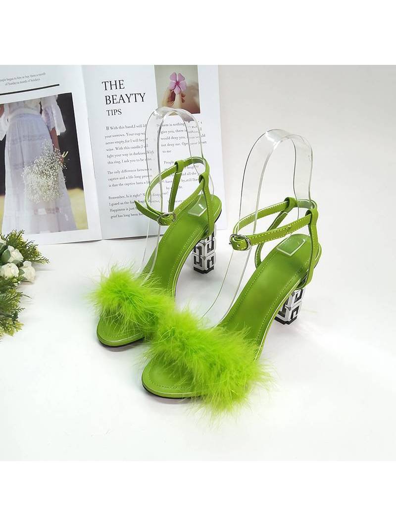 Green leather high-heeled sandals for women.