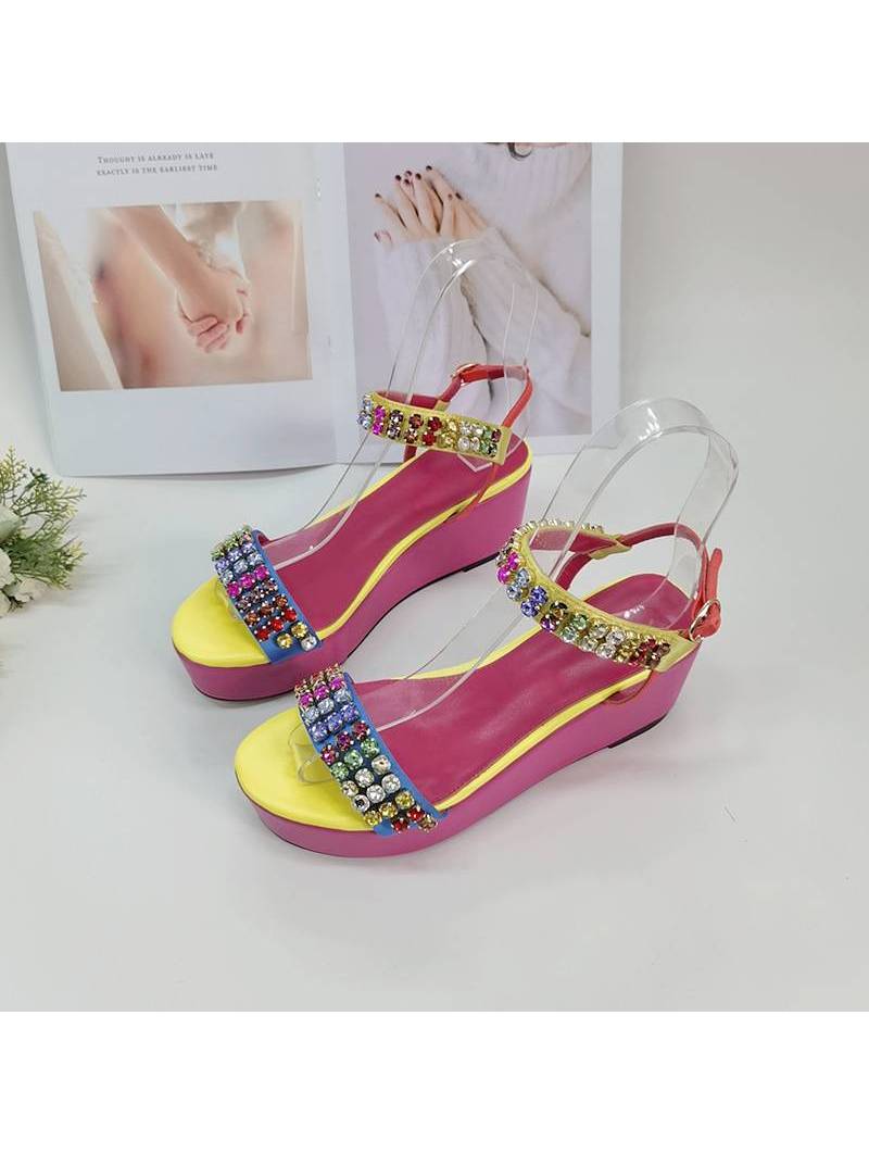 Women's pink platform sandals with genuine leather insole and open toe.