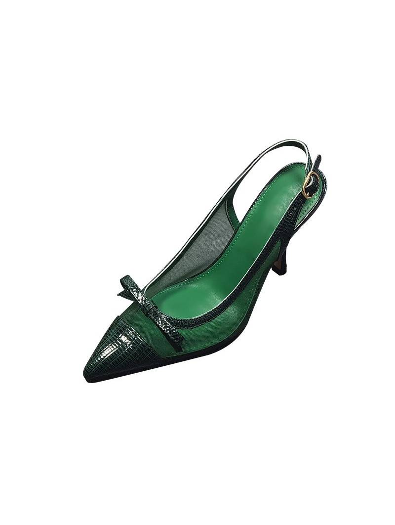 Green leather slingback pumps with stiletto heels, featuring a pointed toe with a bow and a gold-tone metal buckle