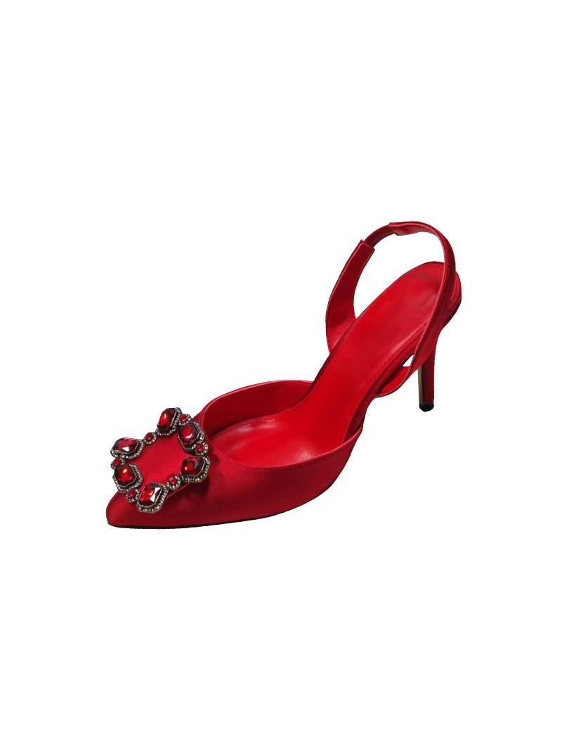 Red satin slingback pumps with stiletto heels, featuring a pointed toe and an elasticated back strap for elegant comfort.